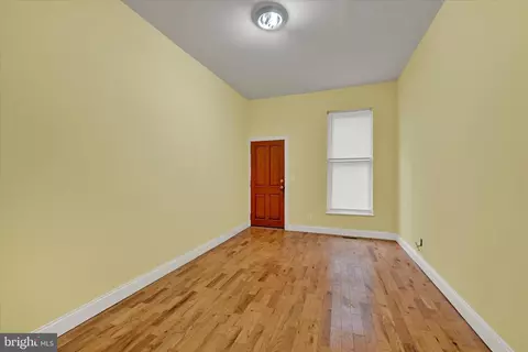 Living - 221 E Lafayette Ave, Baltimore, MD 21202 photo 3 of 7