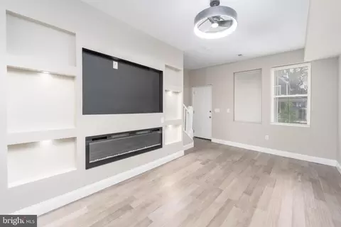 Living - 602 E 38th St, Baltimore, MD 21218 photo 4 of 5