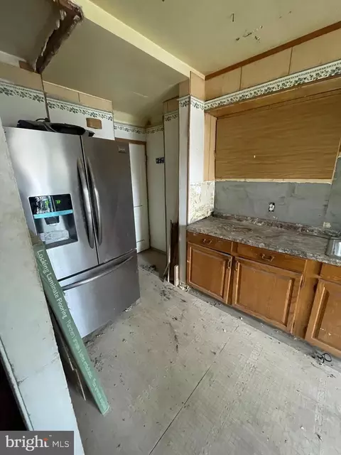 Kitchen - 1312 E Cold Spring Ln, Baltimore, MD 21239 photo 1 of 3