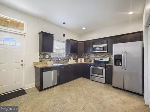 Kitchen - 1705 E Chase St, Baltimore, MD 21213 photo 1 of 2
