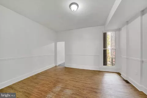 Living - 320 Ilchester Ave, Baltimore, MD 21218 photo 5 of 6