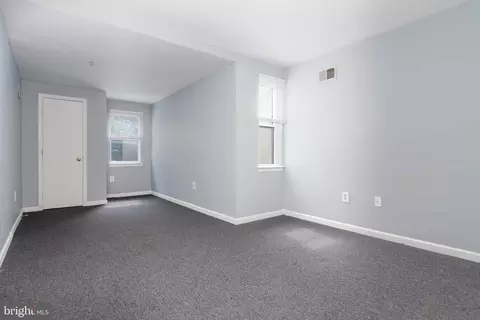 Living - 1137 N Mount St, Baltimore, MD 21217 photo 7 of 8