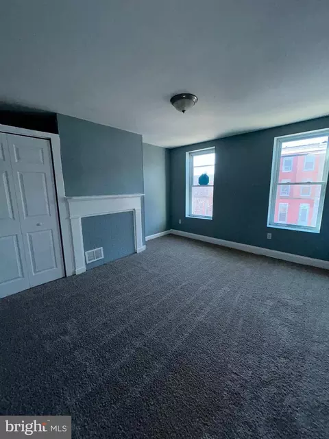 Living - 337 S Mount St, Baltimore, MD 21223 photo 1 of 1