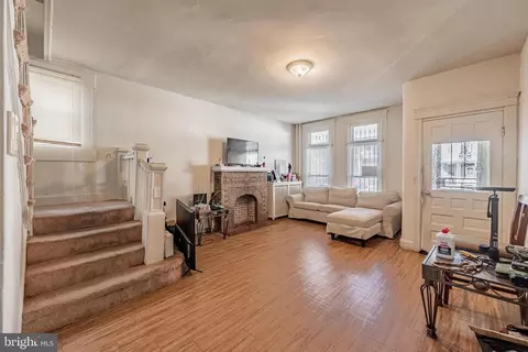Living - 705 E 41st St, Baltimore, MD 21218 photo 2 of 2