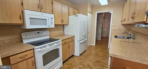 Kitchen - 6350 Red Cedar Pl #211, Baltimore, MD 21209 photo 2 of 3