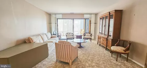 Living - 6350 Red Cedar Pl #211, Baltimore, MD 21209 photo 1 of 1