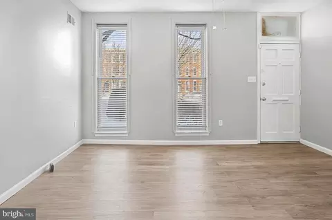 Living - 1032 N Broadway, Baltimore, MD 21205 photo 1 of 2