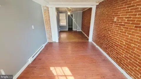 Living - 703 Tessier St, Baltimore, MD 21201 photo 1 of 1