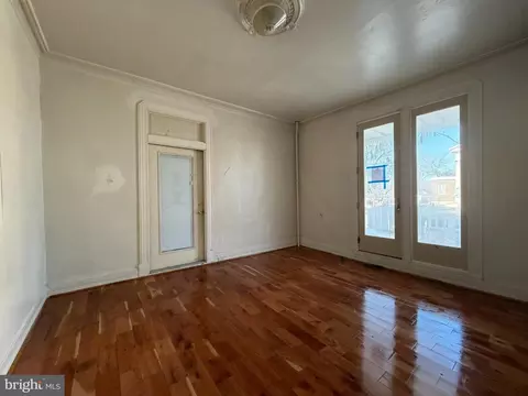 Living - 403 E 31st St, Baltimore, MD 21218 photo 4 of 11