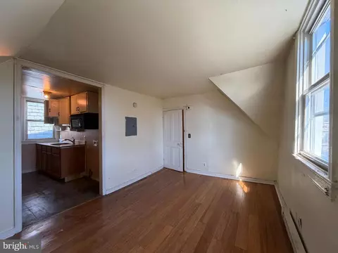 Living - 403 E 31st St, Baltimore, MD 21218 photo 7 of 11