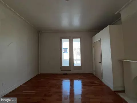Living - 403 E 31st St, Baltimore, MD 21218 photo 2 of 11