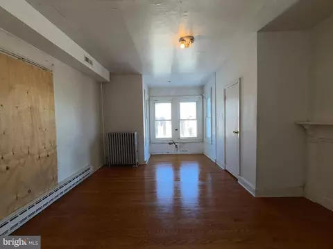 Living - 403 E 31st St, Baltimore, MD 21218 photo 10 of 11