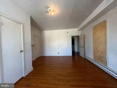 Living - 403 E 31st St, Baltimore, MD 21218 photo 11 of 11