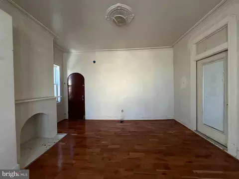 Living - 403 E 31st St, Baltimore, MD 21218 photo 3 of 11