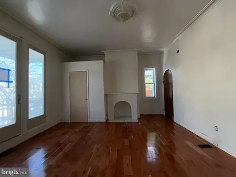 Living - 403 E 31st St, Baltimore, MD 21218 photo 1 of 11