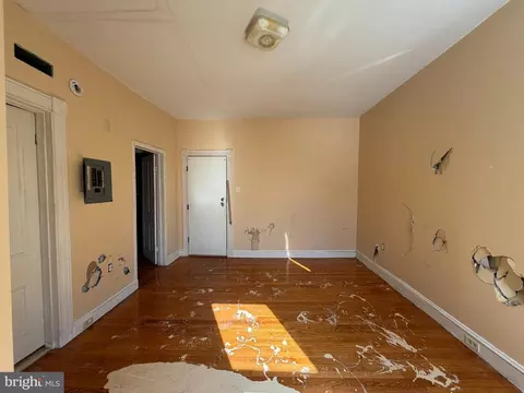 Living - 403 E 31st St, Baltimore, MD 21218 photo 9 of 11