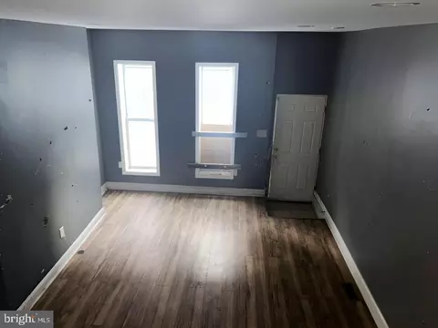 Living - 207 S Pulaski St, Baltimore, MD 21223 photo 1 of 3