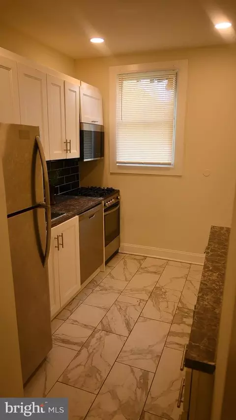 Kitchen - 3613 Greenmount Ave, Baltimore, MD 21218 photo 1 of 2