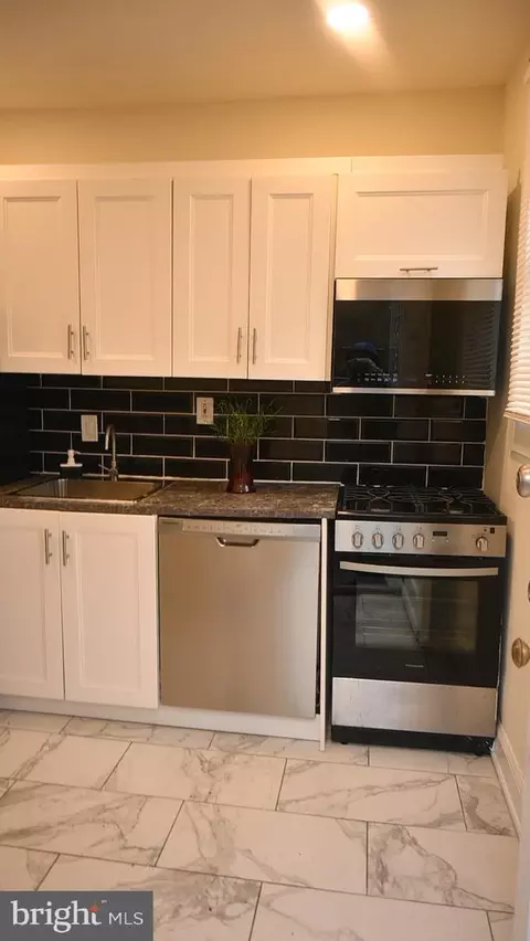 Kitchen - 3613 Greenmount Ave, Baltimore, MD 21218 photo 2 of 2