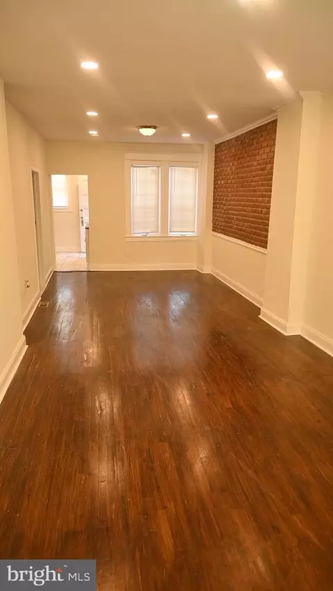 Living - 3613 Greenmount Ave, Baltimore, MD 21218 photo 2 of 2