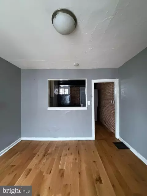 Living - 1607 Lemmon St, Baltimore, MD 21223 photo 1 of 3