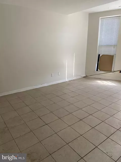 Living - 802 E North Ave, Baltimore, MD 21202 photo 1 of 3