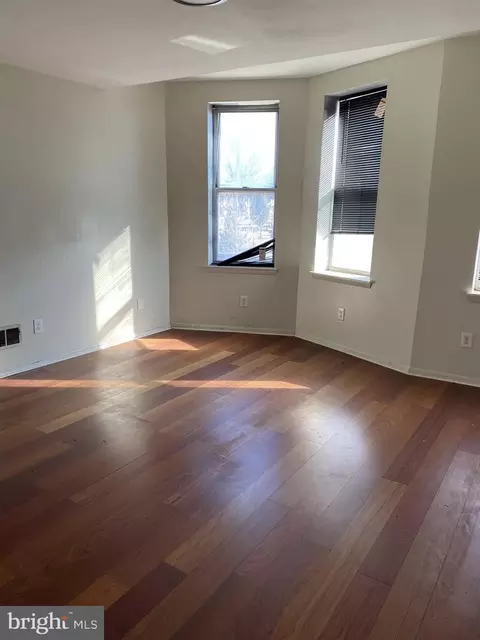 Living - 802 E North Ave, Baltimore, MD 21202 photo 2 of 3