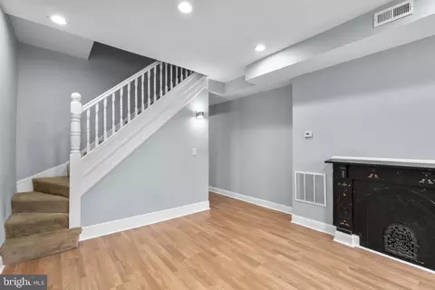 Living - 1217 E Oliver St, Baltimore, MD 21202 photo 1 of 6