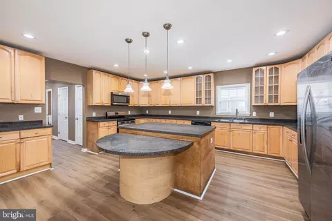 Kitchen - 4021 Barrington Rd, Gwynn Oak, MD 21207 photo 2 of 3