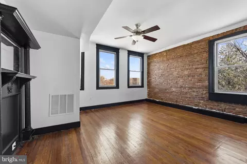 Living - 339 E 31st St, Baltimore, MD 21218 photo 1 of 1