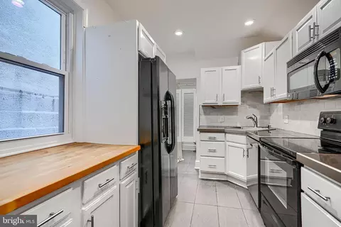 Kitchen - 2123 E Fairmount Ave, Baltimore, MD 21231 photo 2 of 3