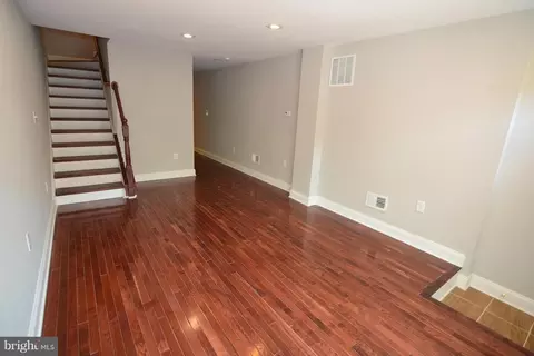 Living - 1009 N Washington St N, Baltimore, MD 21205 photo 2 of 3