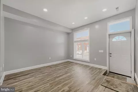 Living - 3127 E Monument St, Baltimore, MD 21205 photo 2 of 4