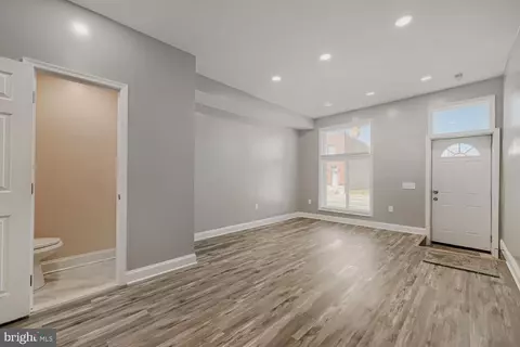 Living - 3127 E Monument St, Baltimore, MD 21205 photo 3 of 4