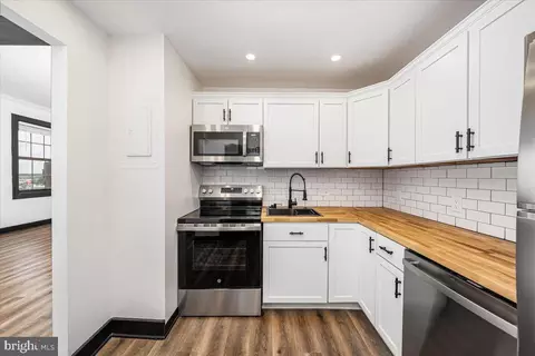 Kitchen - 1 E Chase St #1008, Baltimore, MD 21202 photo 2 of 2
