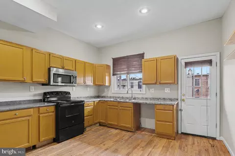 Kitchen - 3418 E Baltimore St, Baltimore, MD 21224 photo 1 of 3