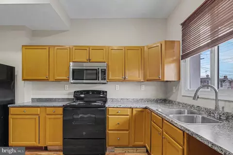 Kitchen - 3418 E Baltimore St, Baltimore, MD 21224 photo 2 of 3