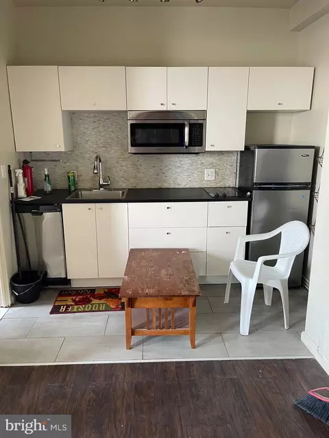 Kitchen - 1001 Saint Paul St N #4E, Baltimore, MD 21202 photo 2 of 2