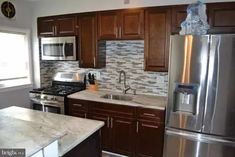 Kitchen - 5153 Frederick Ave, Baltimore, MD 21229 photo 1 of 2