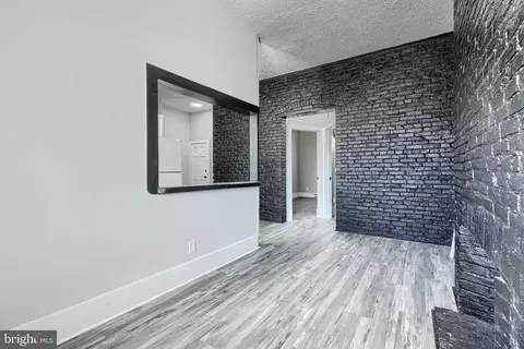 Living - 617 N Paca St, Baltimore, MD 21201 photo 1 of 1