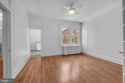 Living - 2417 Eutaw Pl, Baltimore, MD 21217 photo 9 of 10