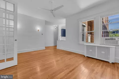 Living - 2417 Eutaw Pl, Baltimore, MD 21217 photo 3 of 10