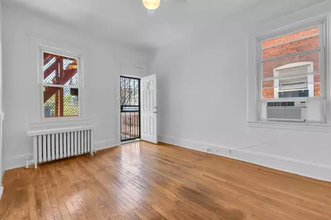 Living - 2417 Eutaw Pl, Baltimore, MD 21217 photo 4 of 10