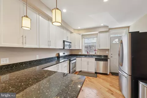 Kitchen - 341 S Macon St, Baltimore, MD 21224 photo 1 of 2