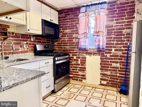 Kitchen - 825 E 34th St, Baltimore, MD 21218 photo 1 of 2