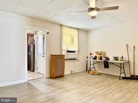 Living - 825 E 34th St, Baltimore, MD 21218 photo 3 of 4