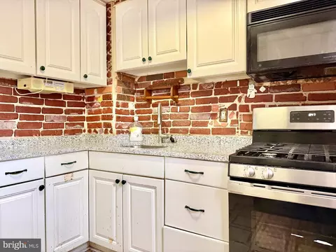 Kitchen - 825 E 34th St, Baltimore, MD 21218 photo 2 of 2