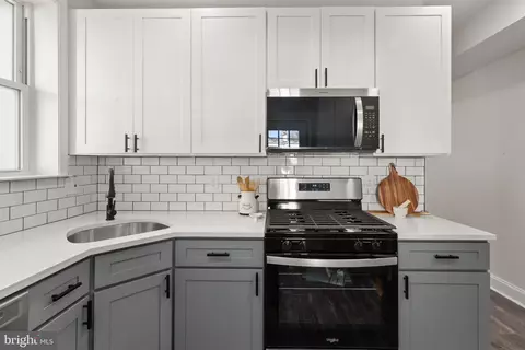 Kitchen - 822 E 41st St, Baltimore, MD 21218 photo 1 of 2