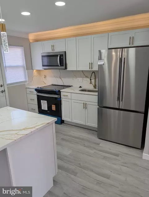 Kitchen - 4718 Parkside Dr, Baltimore, MD 21206 photo 2 of 2