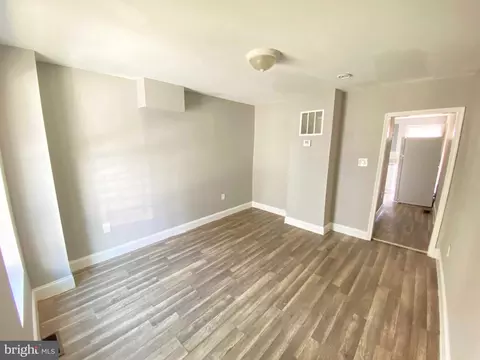 Living - 107 S Dean St, Baltimore, MD 21224 photo 2 of 5